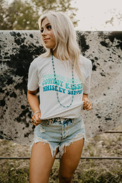 Turquoise Drippin’, Cowboy Kissin’, Sippin’ Graphic Tee